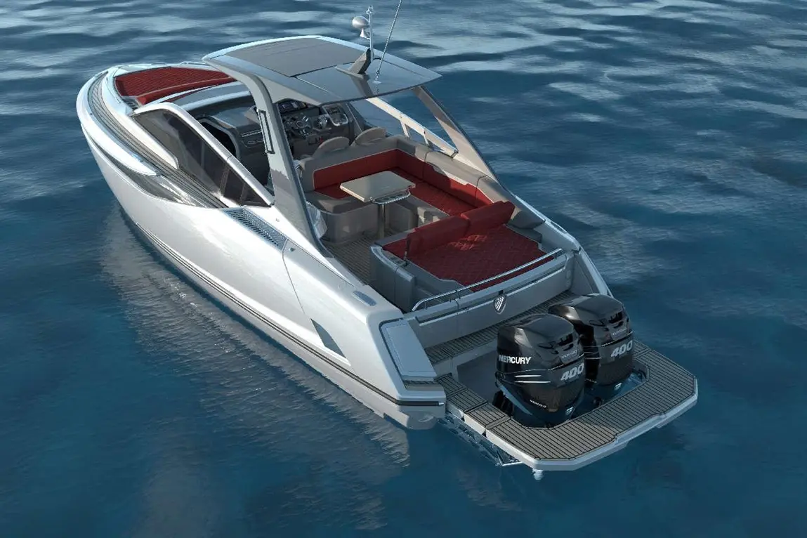 A sleek motorboat with a spacious seating area and two Mercury 400 outboard engines, floating on calm blue waters.